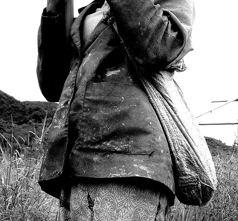 Woman in rice paddy; Ban NaKaang, Laos, 2008