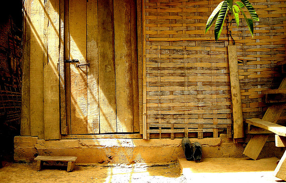 House and shoes; Ban NaKaang, Laos, 2009