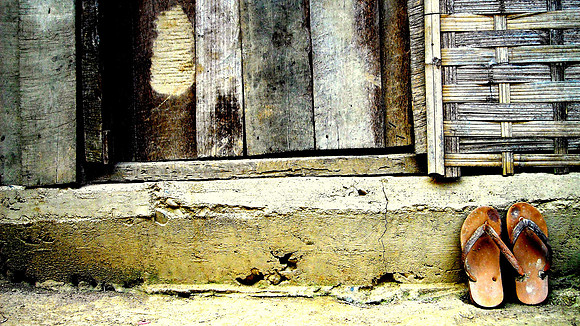 House and shoes; Ban KaNaang, Laos, 2009